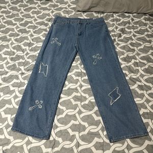 Brand New Blue jeans with crosses and lightnings